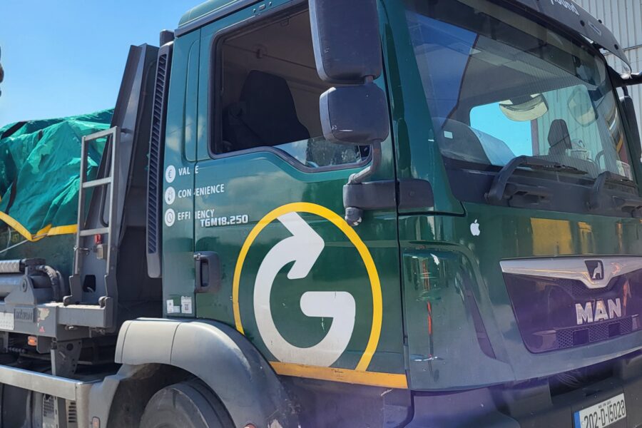 A greyhound bin truck