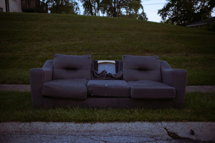 Bulky Waste - sofa being disposed of at the side of the road