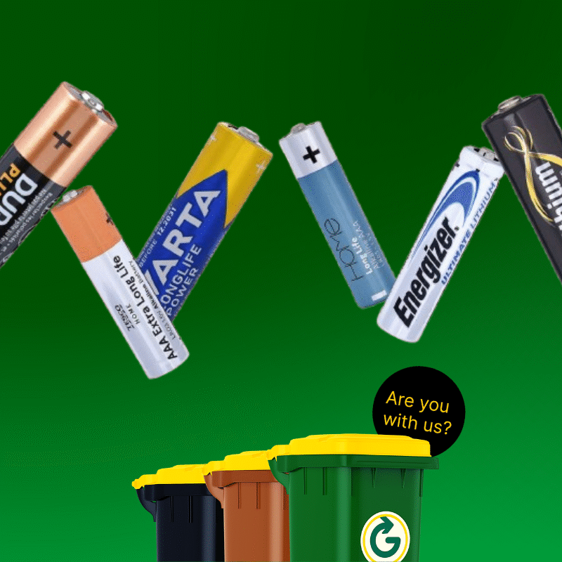 Green Background with bins and 6 batteries for a blog around - Can I Put Batteries in My Recycle Bin?